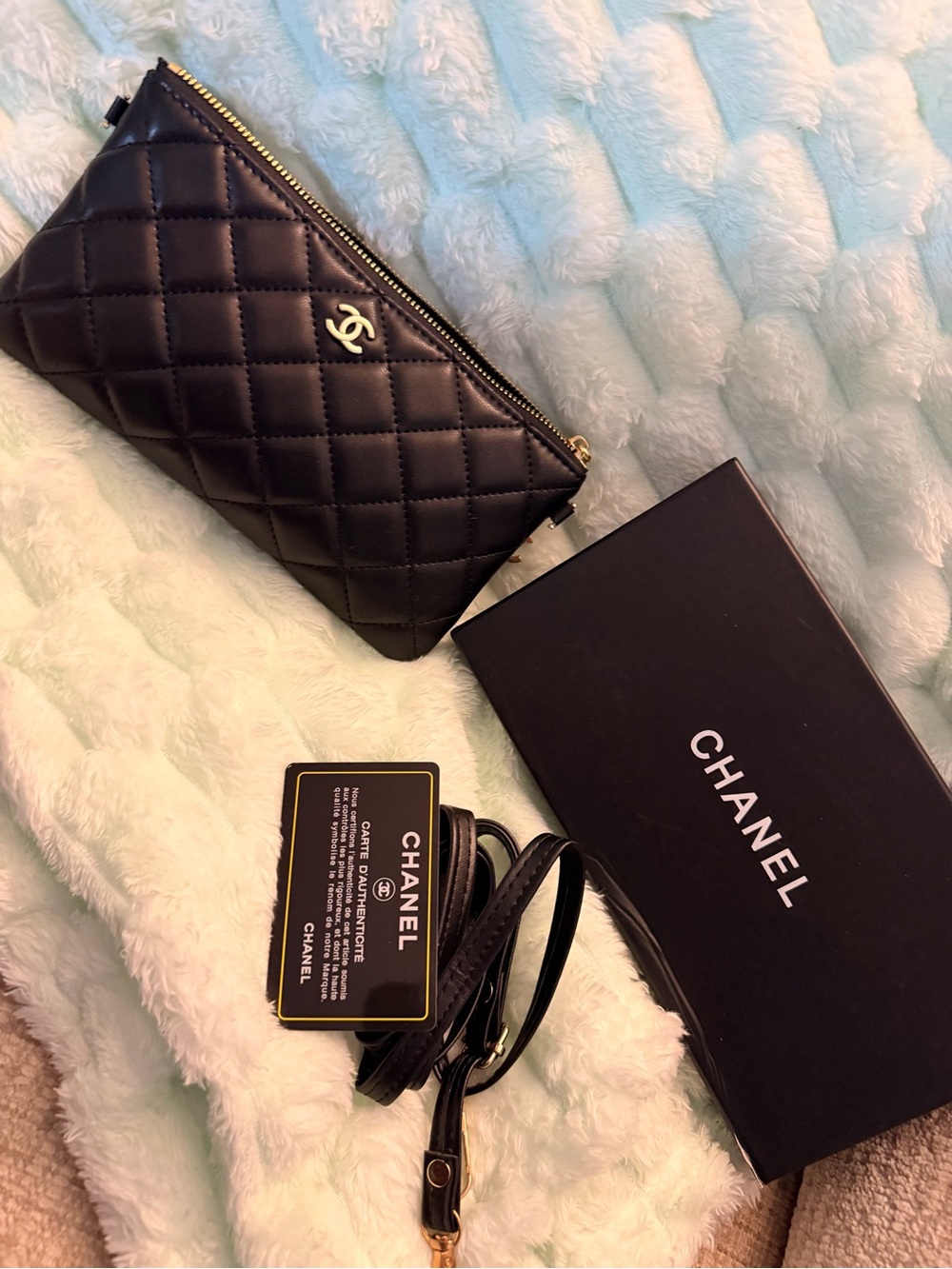 CHANEL Black Quilted Leather Zip Wristlet with Gold CC